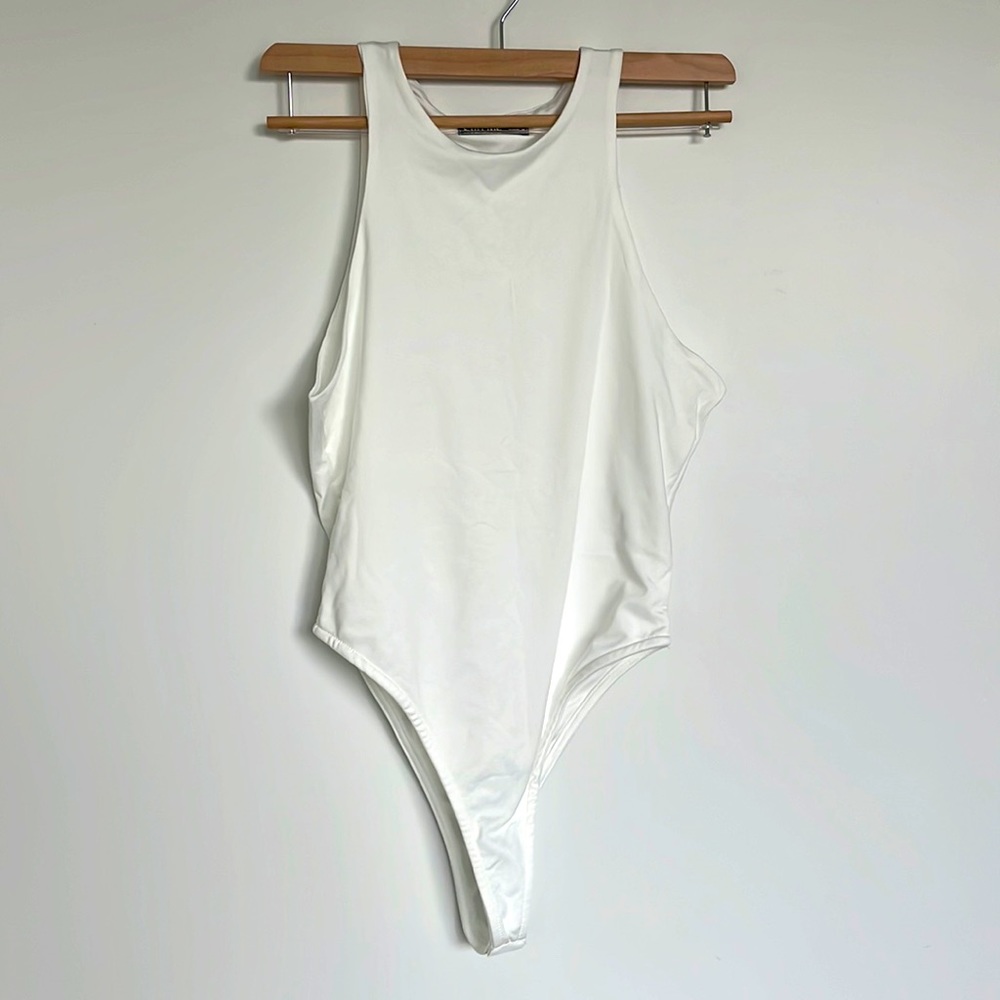 Ivory bodysuit. Lightweight . High neck and sleeveless
